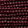 1 Strang (~200 Stk) facettierte Perlen, rund ~2,2mm, dunkles Granatrot