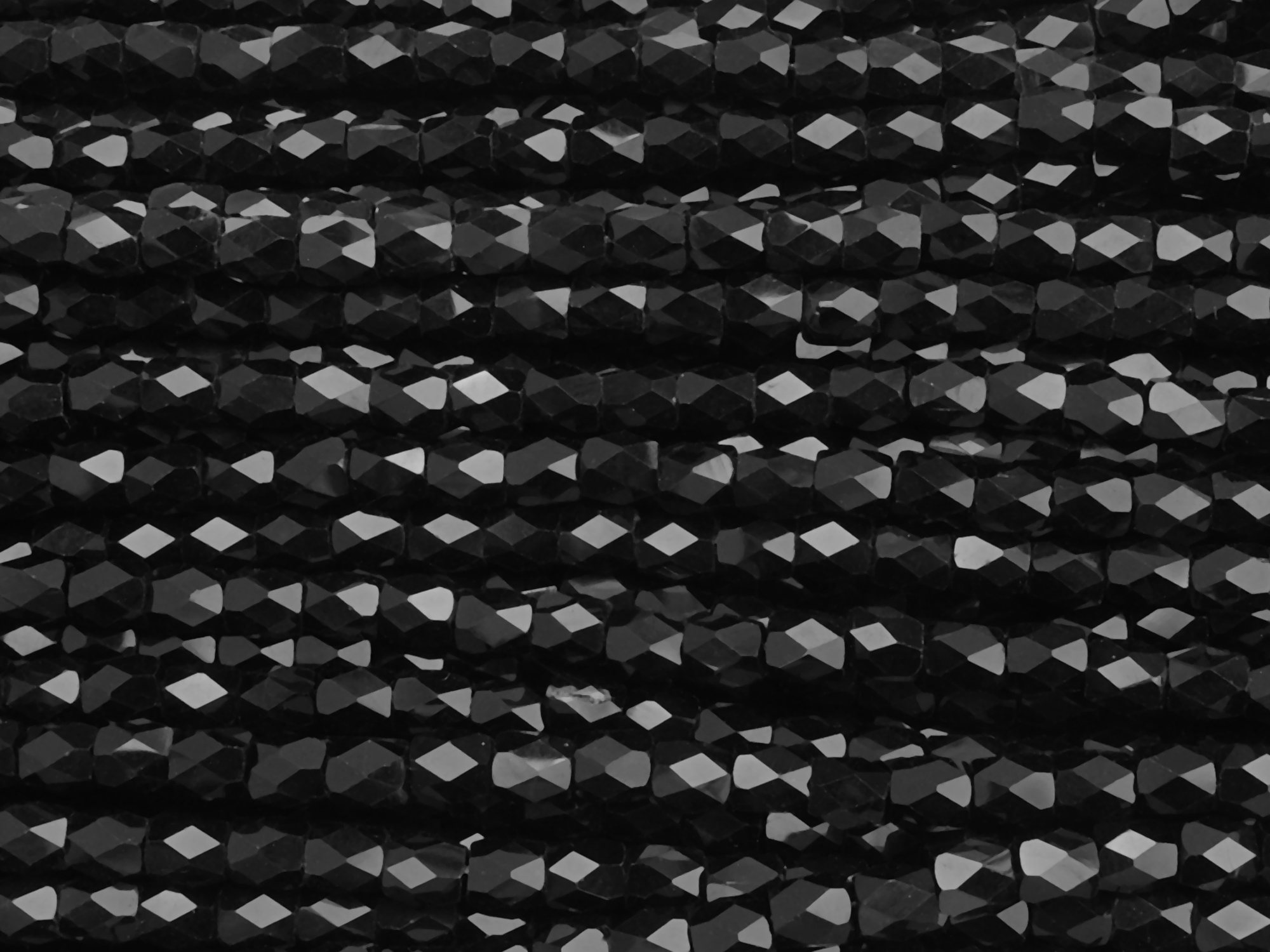 schwarze, tönnchenförmige, facettierte Glitzerperlen 3mm zum