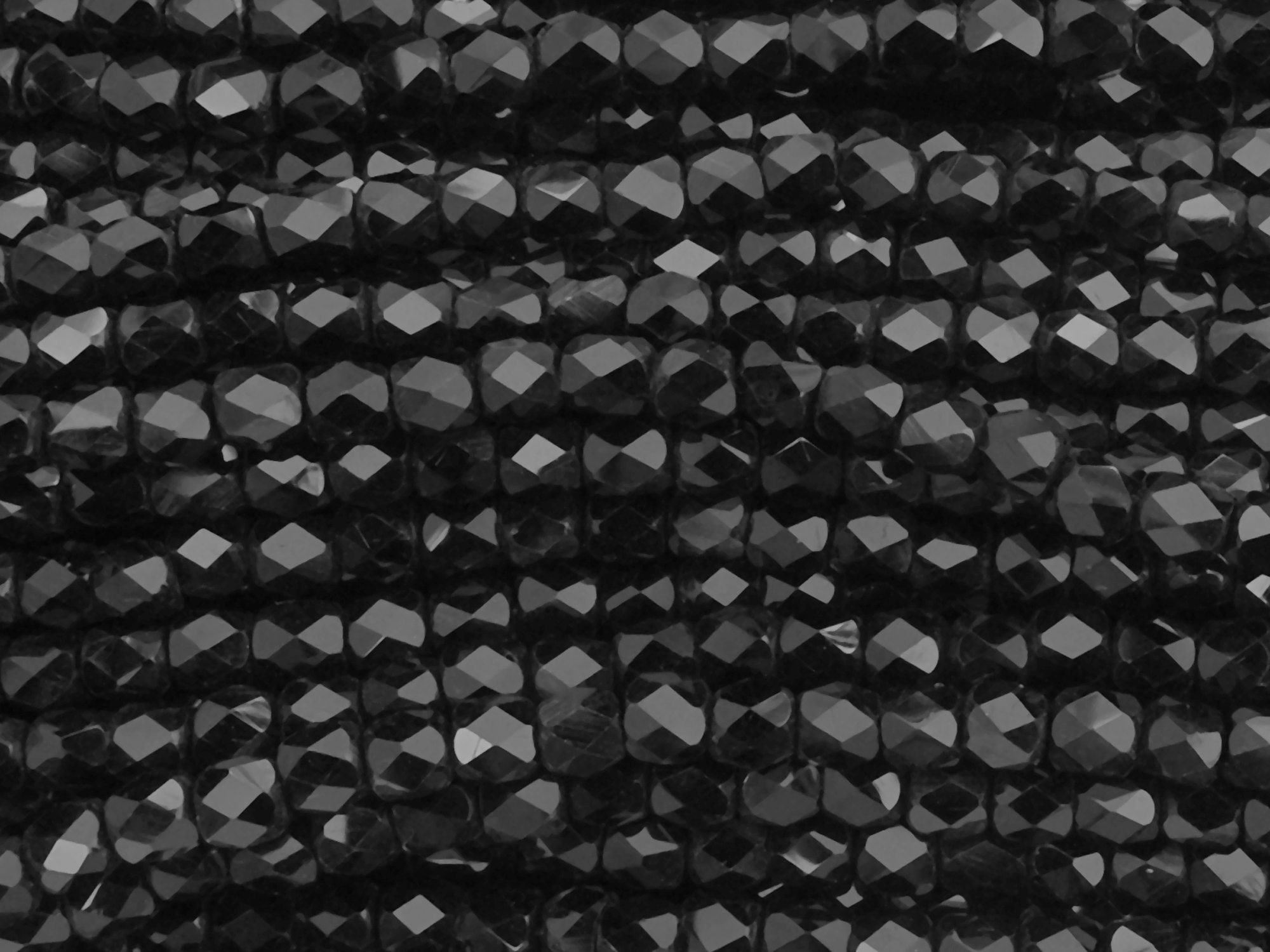 schwarze, tönnchenförmige, facettierte Glasperlen 4mm