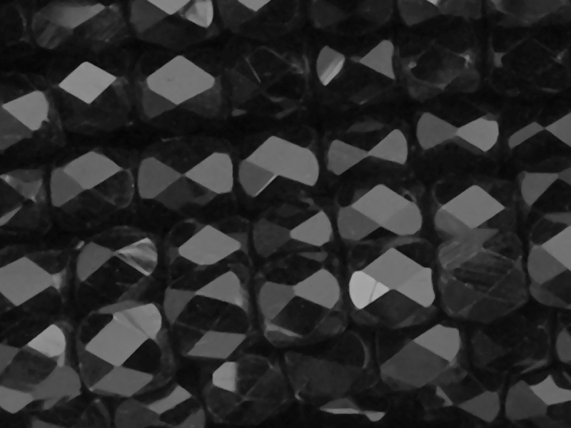 schwarze, tönnchenförmige, facettierte Glasperlen 4mm - Naha