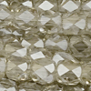 1 Strang (~100 Stk.) facettierte Tönnchen ~4mm, Champagner