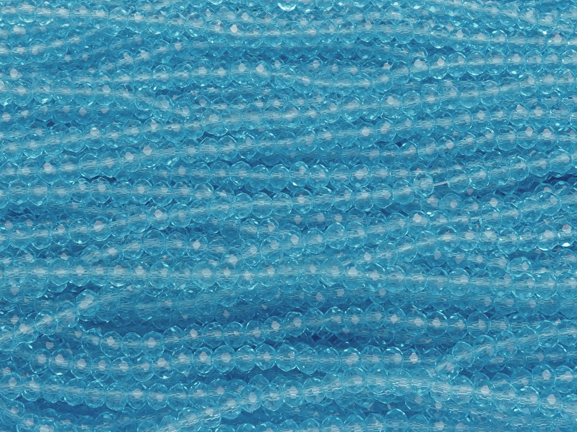 facettierte, geschliffene Glasperlen 2x3mm Farbe: Aquamarine